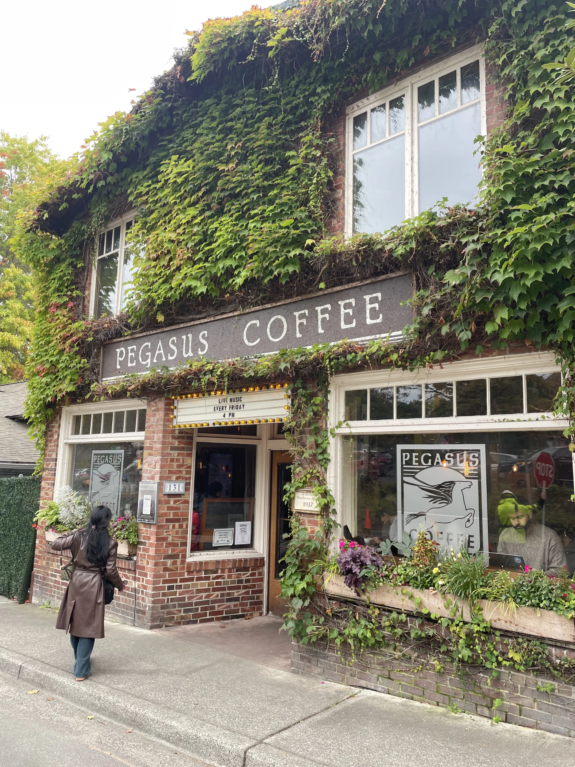 Stopping by the ivy-draped Pegasus Coffee House on a crisp morning walk.